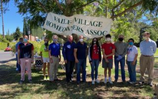 NCVV Board members Dorothy Apple, Alice Hart and Tony Braswell join elected officials in honoring Eileen Garcia and Jake Kovinsky