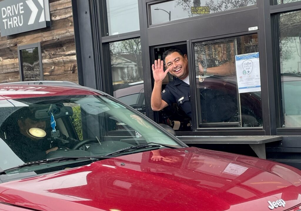 Officer in Starbucks window