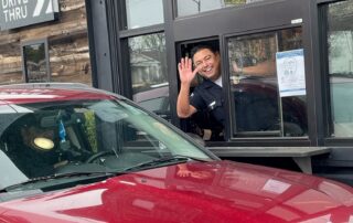 Officer in Starbucks window