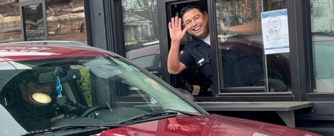 Officer in Starbucks window