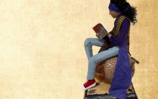 Black girl reading a book sitting on an acorn