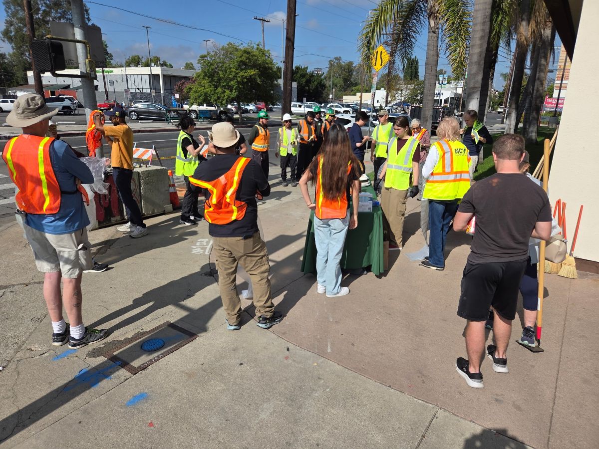 1000030129 ready to start cleaning laurel Group of people at the Laurel Canyon Clean Up Listening to instructions