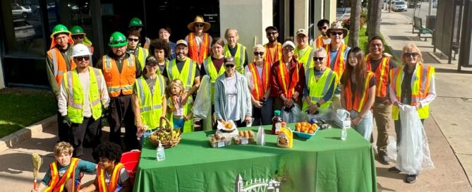 Group of people invest standing behind the Neighborhood Council Valley Village table at the Laurel Canyon cleanup