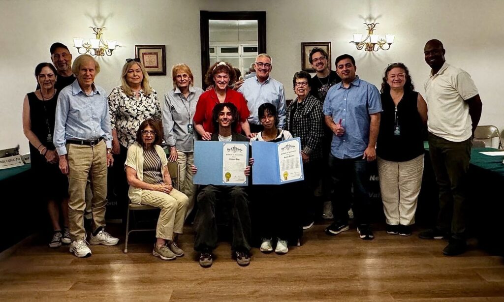 NCVV Board with 2 exchange students