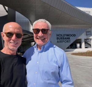 Two men at airport tour
